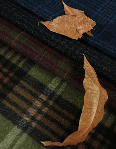 Technical Evaluation: Thermal Efficiency and Structural Integrity of a Double Faced lana Overcoat